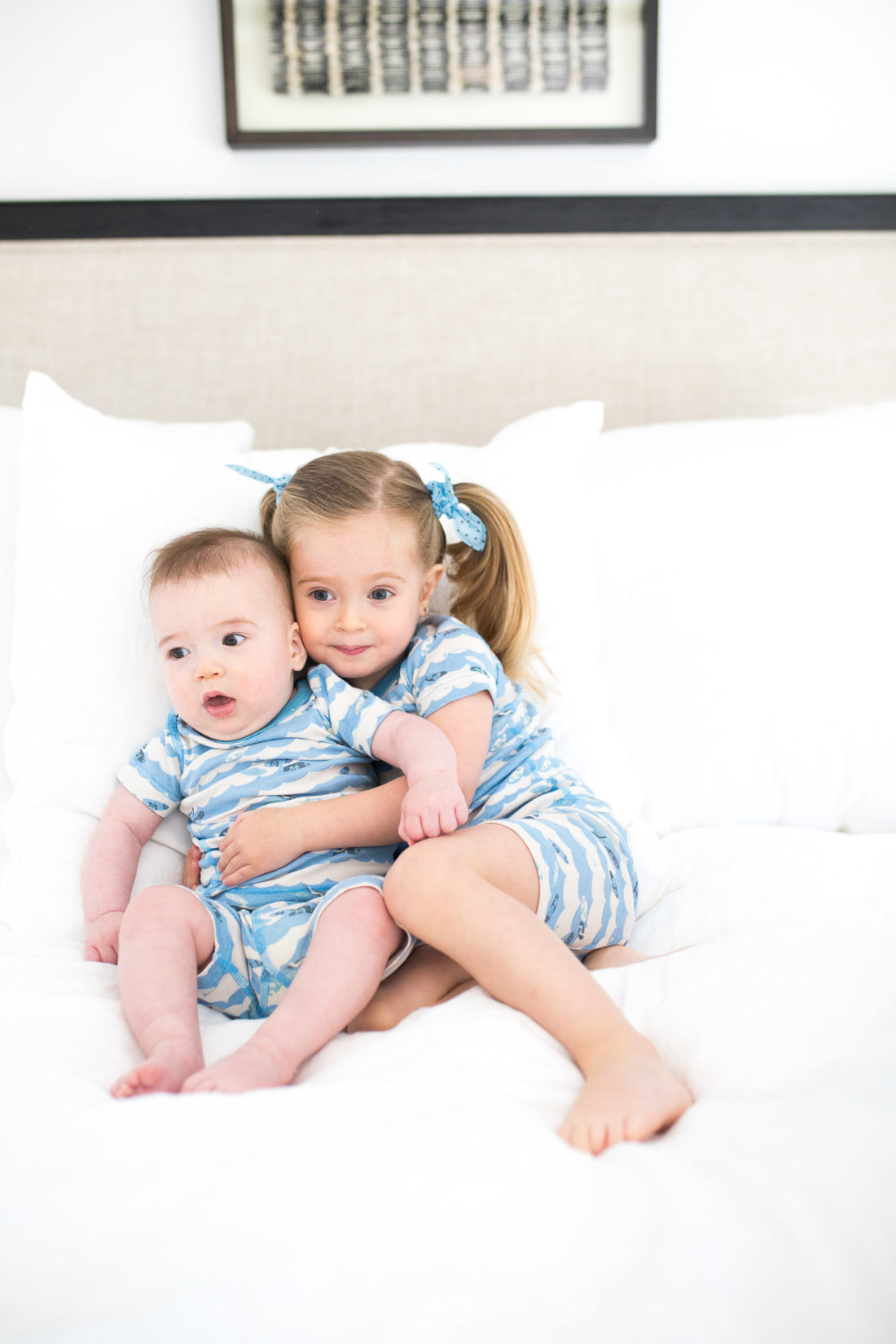 Marlowe Martino hugs her little brother Major in matching pajamas