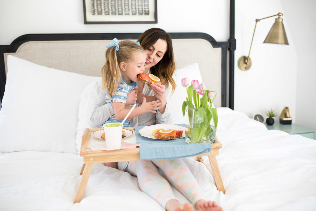 Marlowe Martino bites in to her Mom's smoked salmon toast