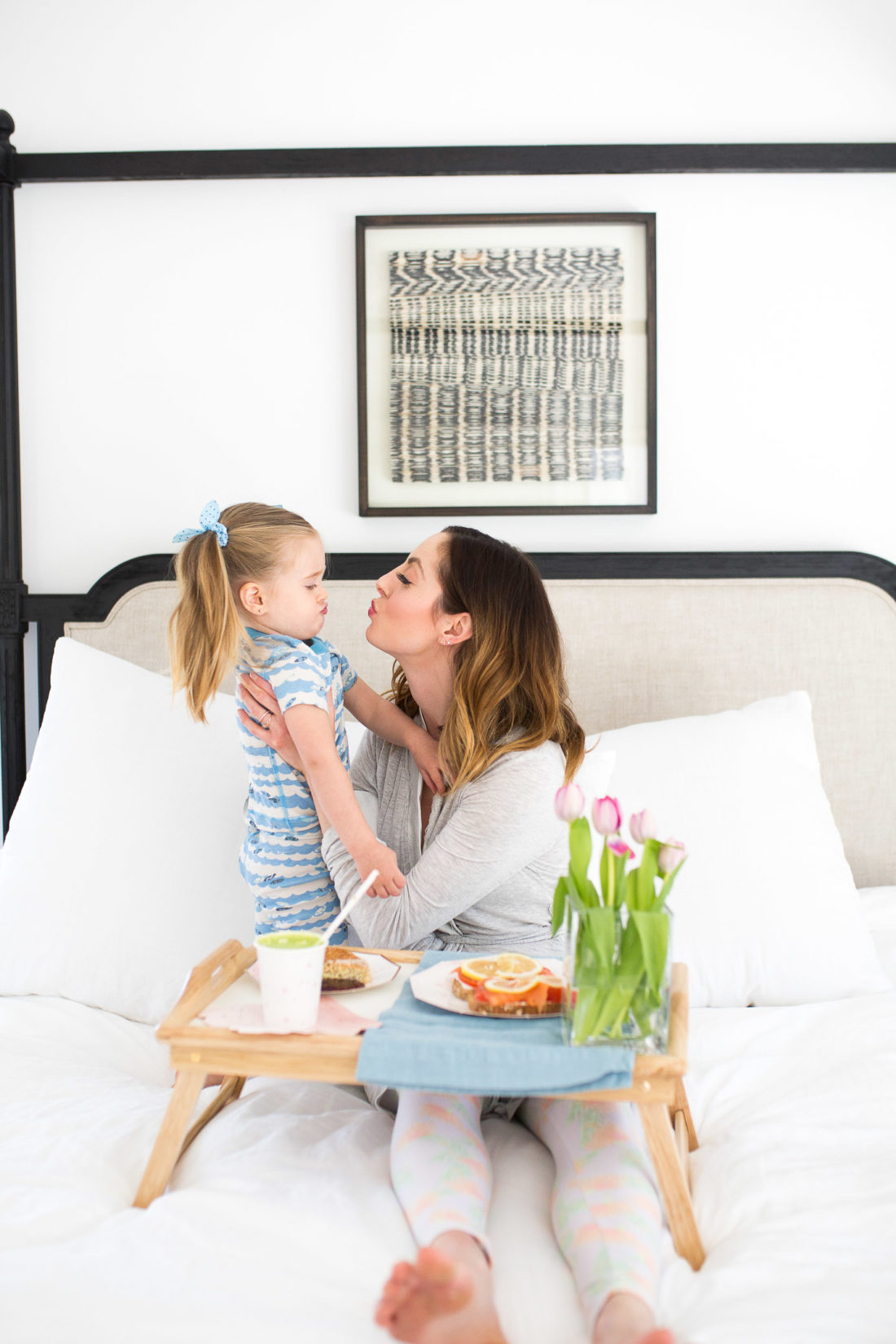 Eva Amurri Martino kisses her daughter Marlowe in bed
