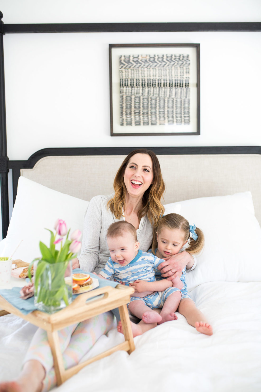 Eva Amurri Martino has both of her children on her lap for a Mother's Day breakfast in bed