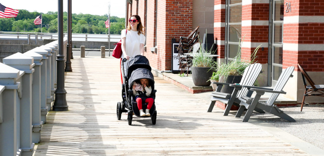 Eva Amurri Martino walks with her two children in a Baby Jogger Stroller down the street in downtown Westport