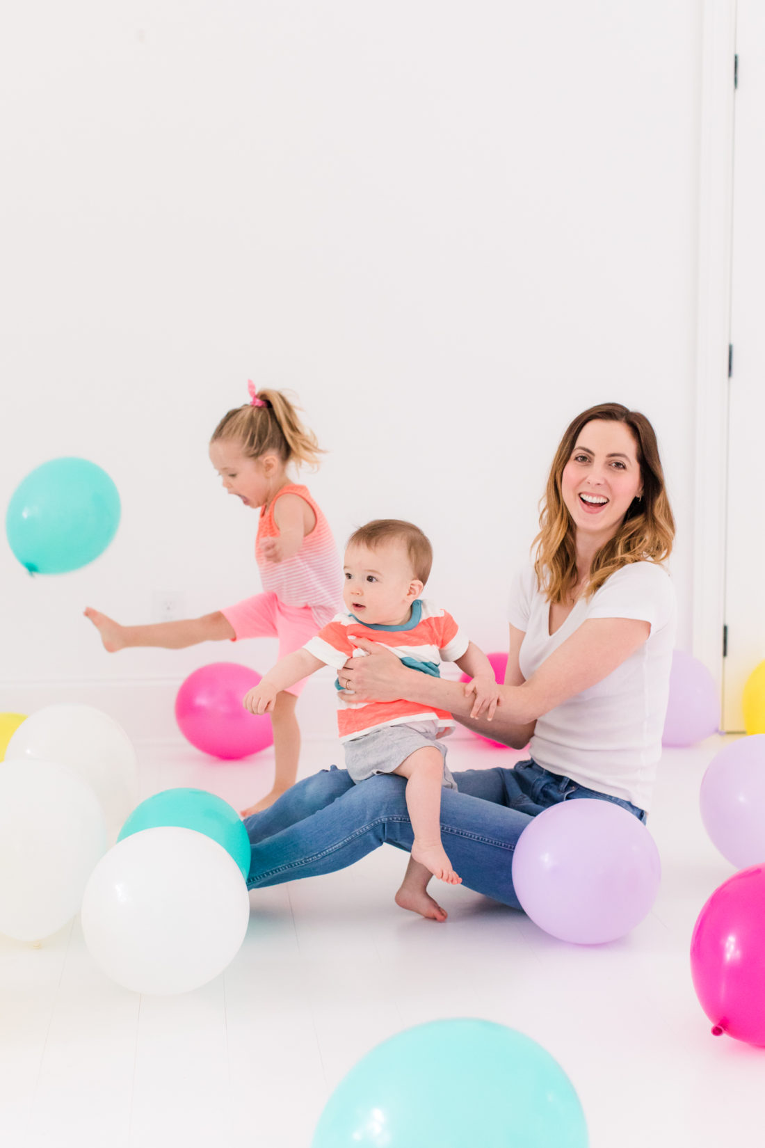 Eva Amurri Martino stands in the Happily Eva After studio filled with balloons to celebrate the second anniversary of the blog