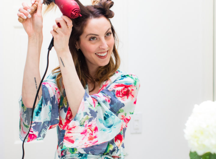 Eva Amurri Martino wears a floral silk robe and gives herself a bouncy blowout in the bathroom of her connecticut home