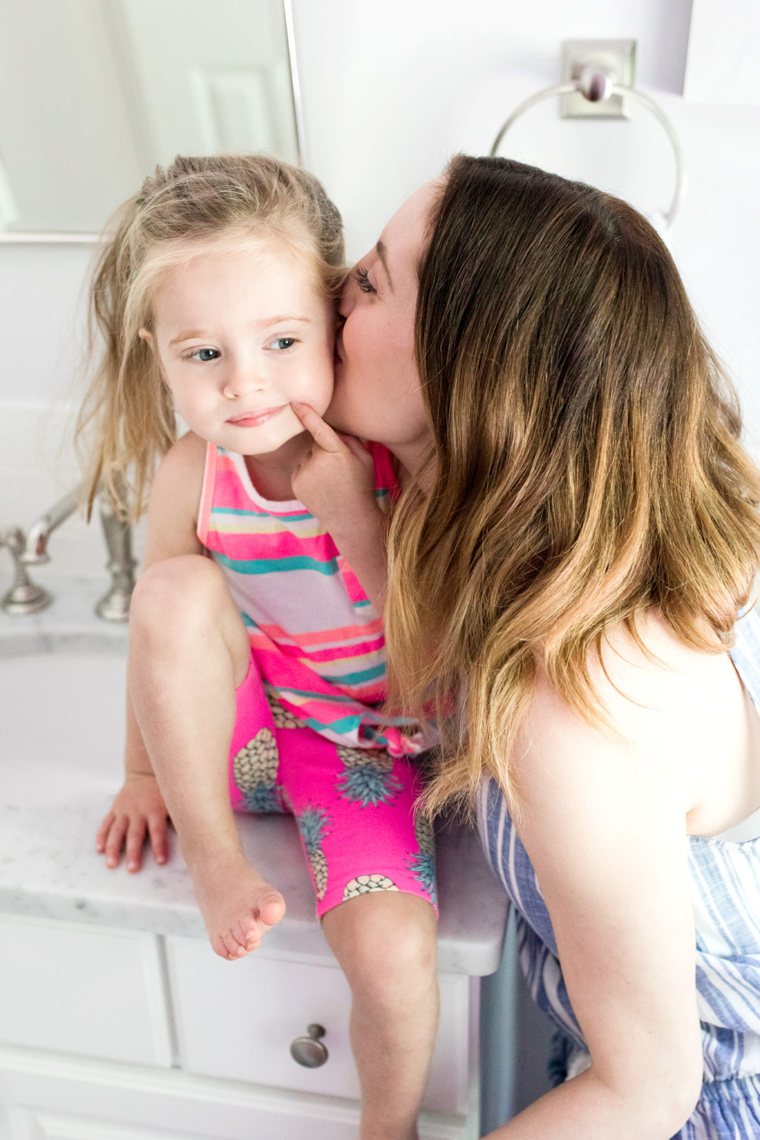 Eva Amurri Martino whispers in to Marlowe Martino's ear in the bathroom of their Connecticut home