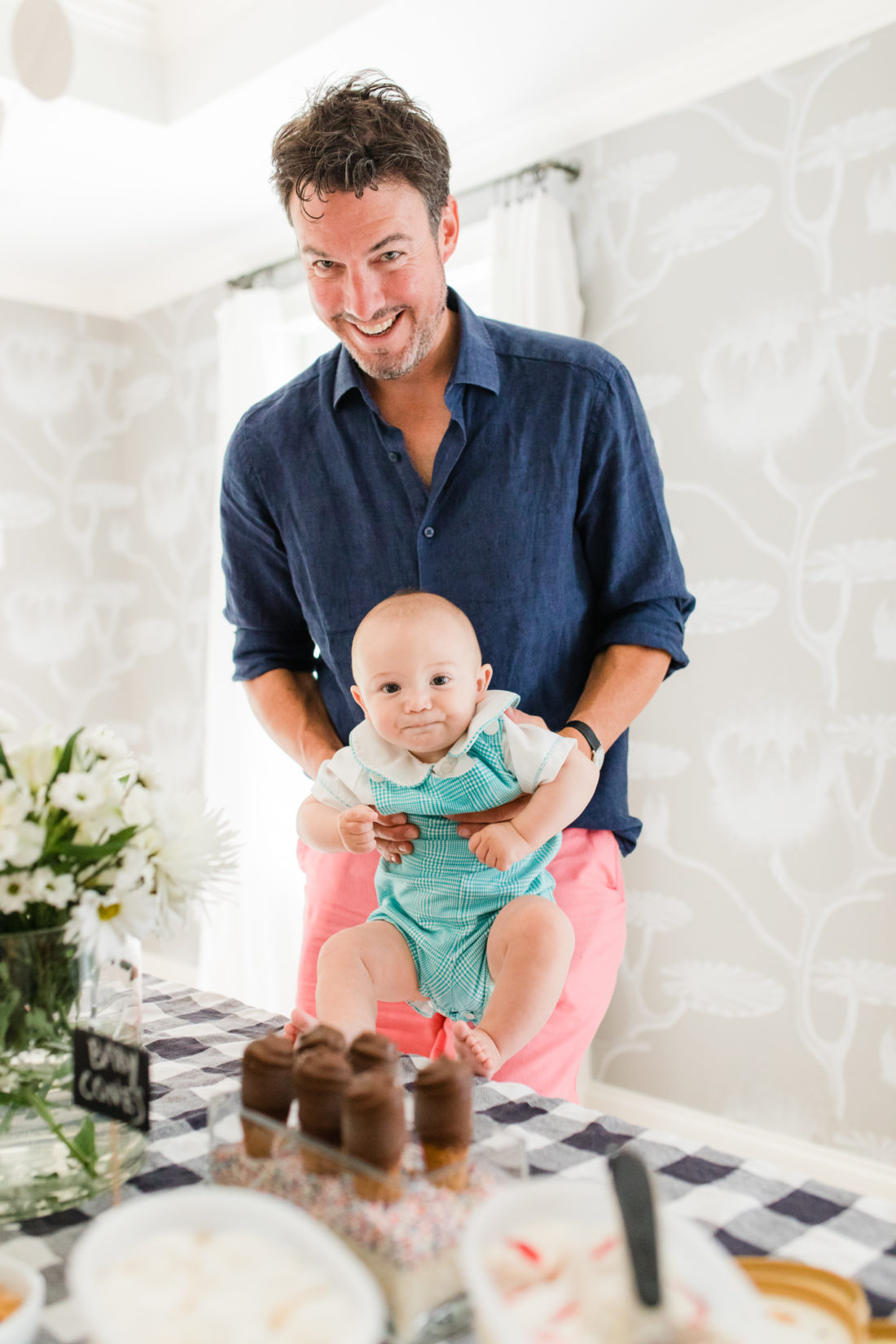 Brett Hutchinson and son Schafer hang out at the Happily Eva After Ice Cream social with Blue Bunny