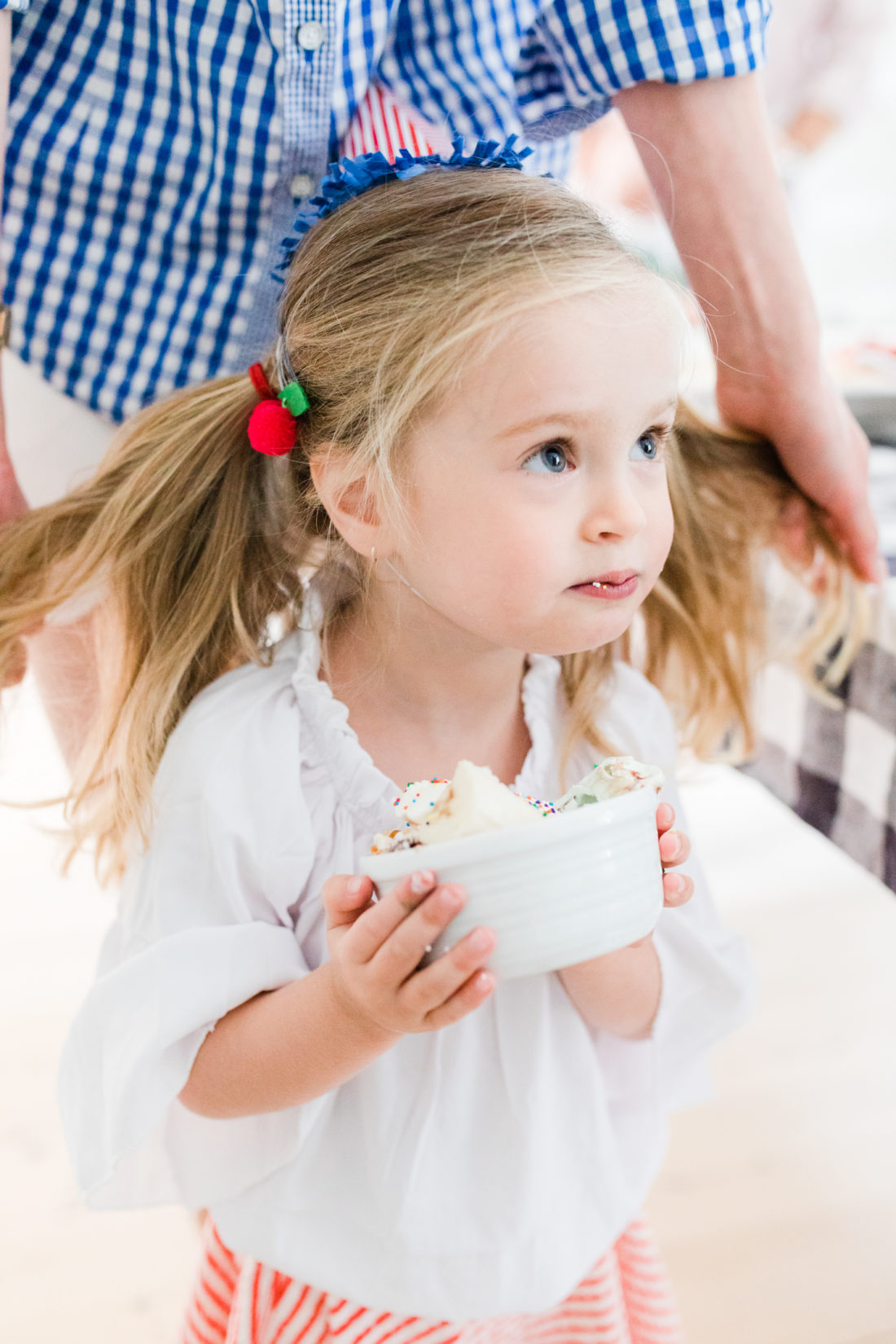 Marlowe Martino tucks in to her Blue Bunny ice cream sundae