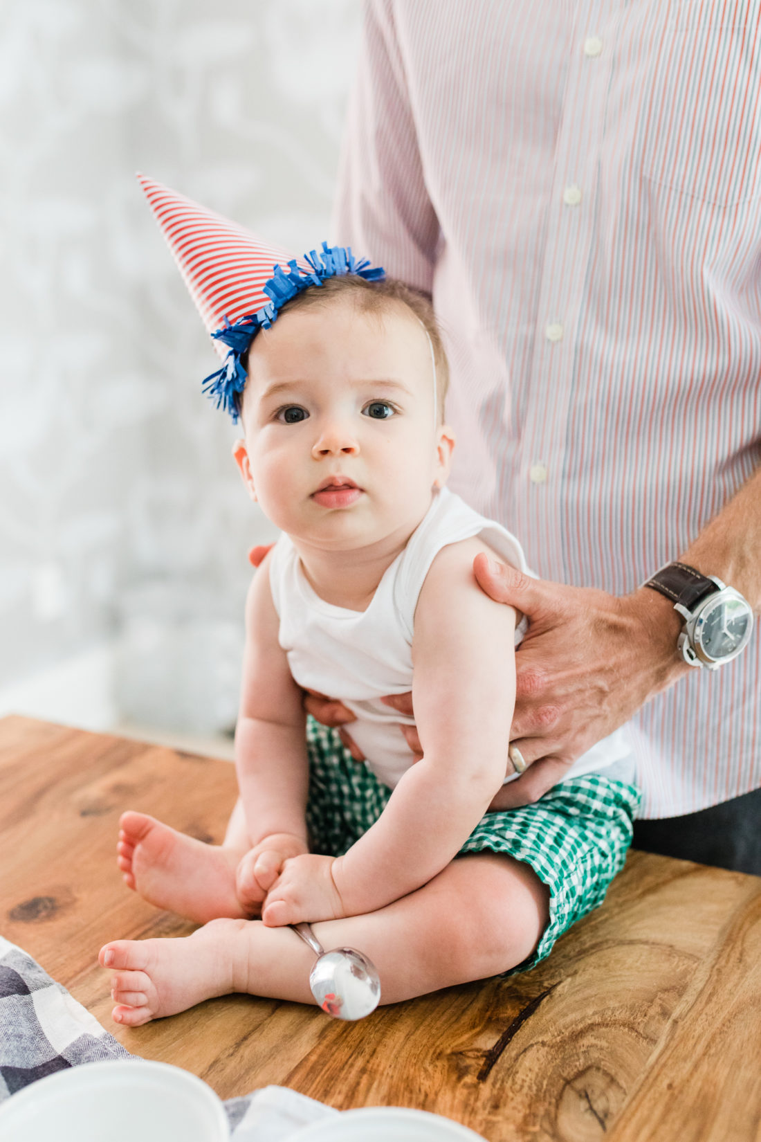 Major Martino wears a striped party hat to hang out at the Happily Eva After ice cream social with Blue Bunny