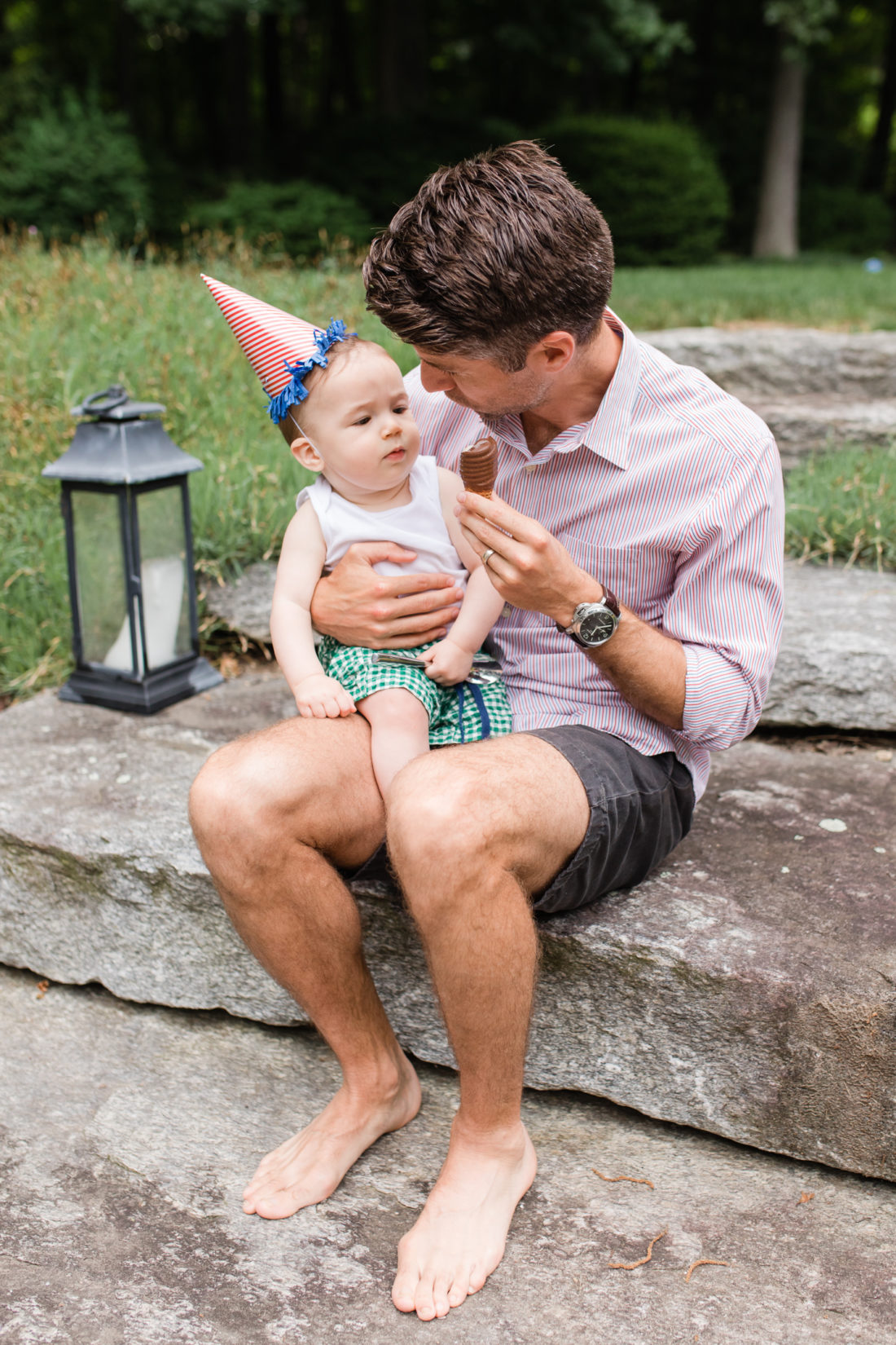 Kyle Martino sits with son Major James outside at their home in Connecticut