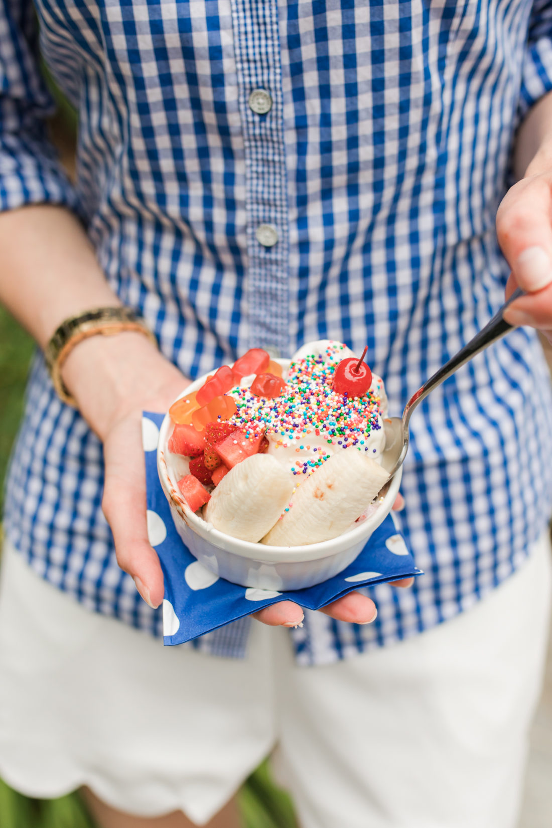 Eva Amurri Martino holds a colorful Blue Bunny ice cream sundae