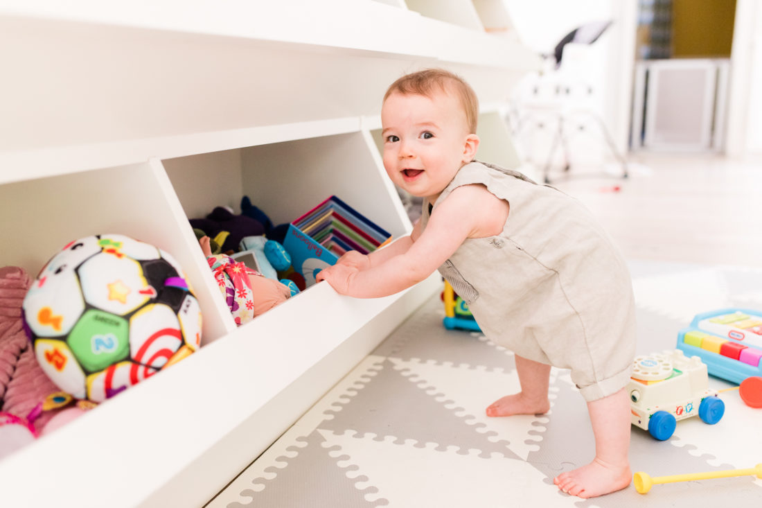 Eight month old Major Martino sits among his colorful toys at home in Connecticut