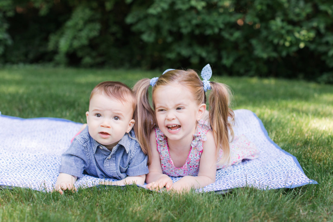 Marlowe and Major Martino lay on a picnic blanket together on the grass outside their Connecticut home