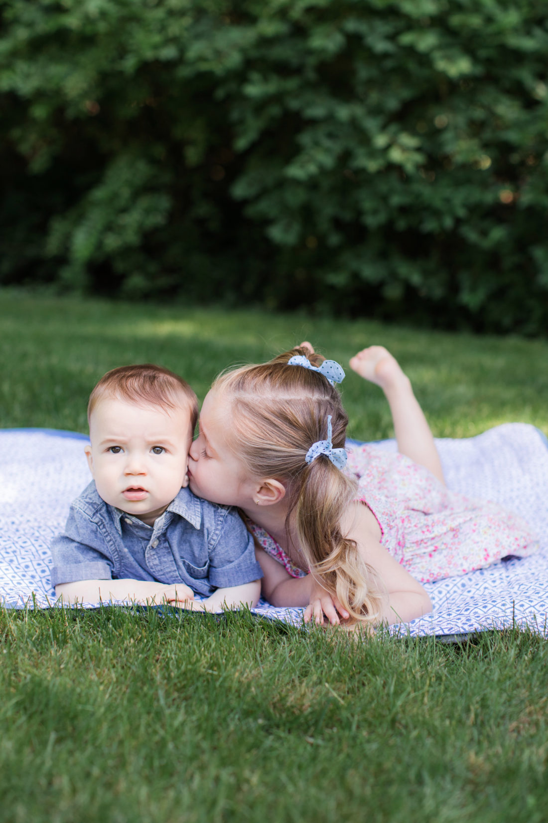 Marlowe and Major Martino lay on a picnic blanket together on the grass outside their Connecticut home