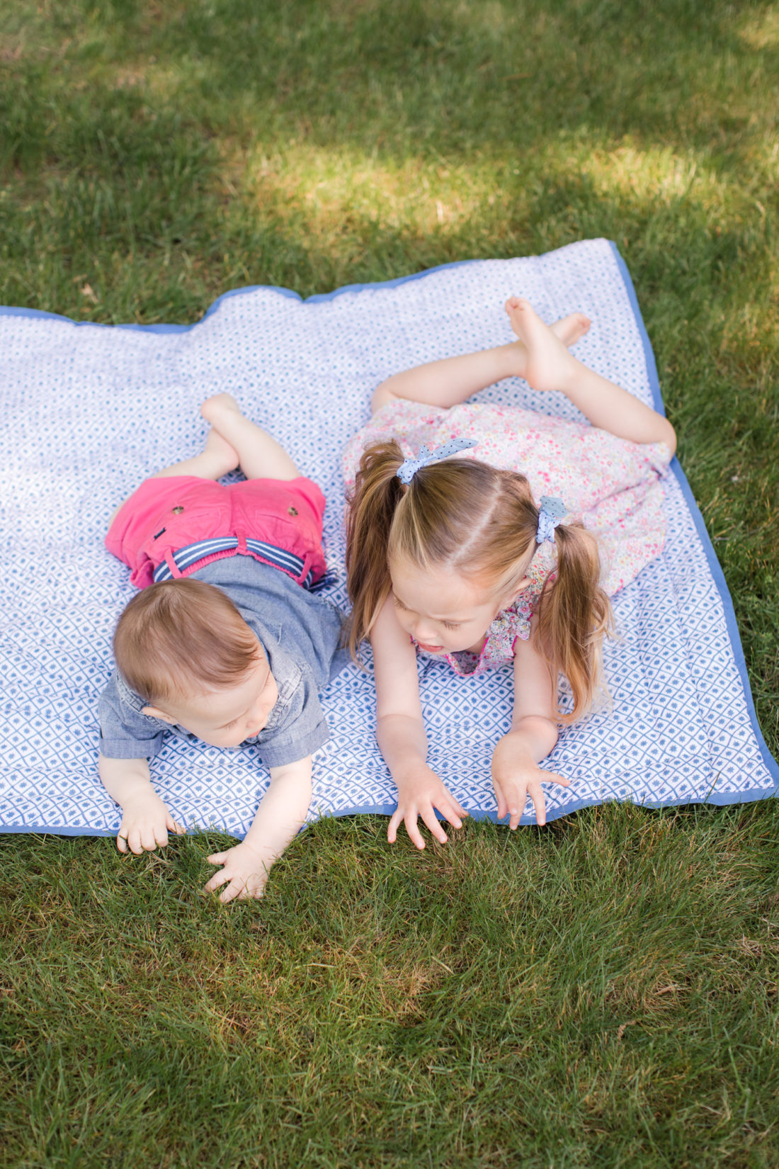 Marlowe and Major Martino lay on a picnic blanket together on the grass outside their Connecticut home