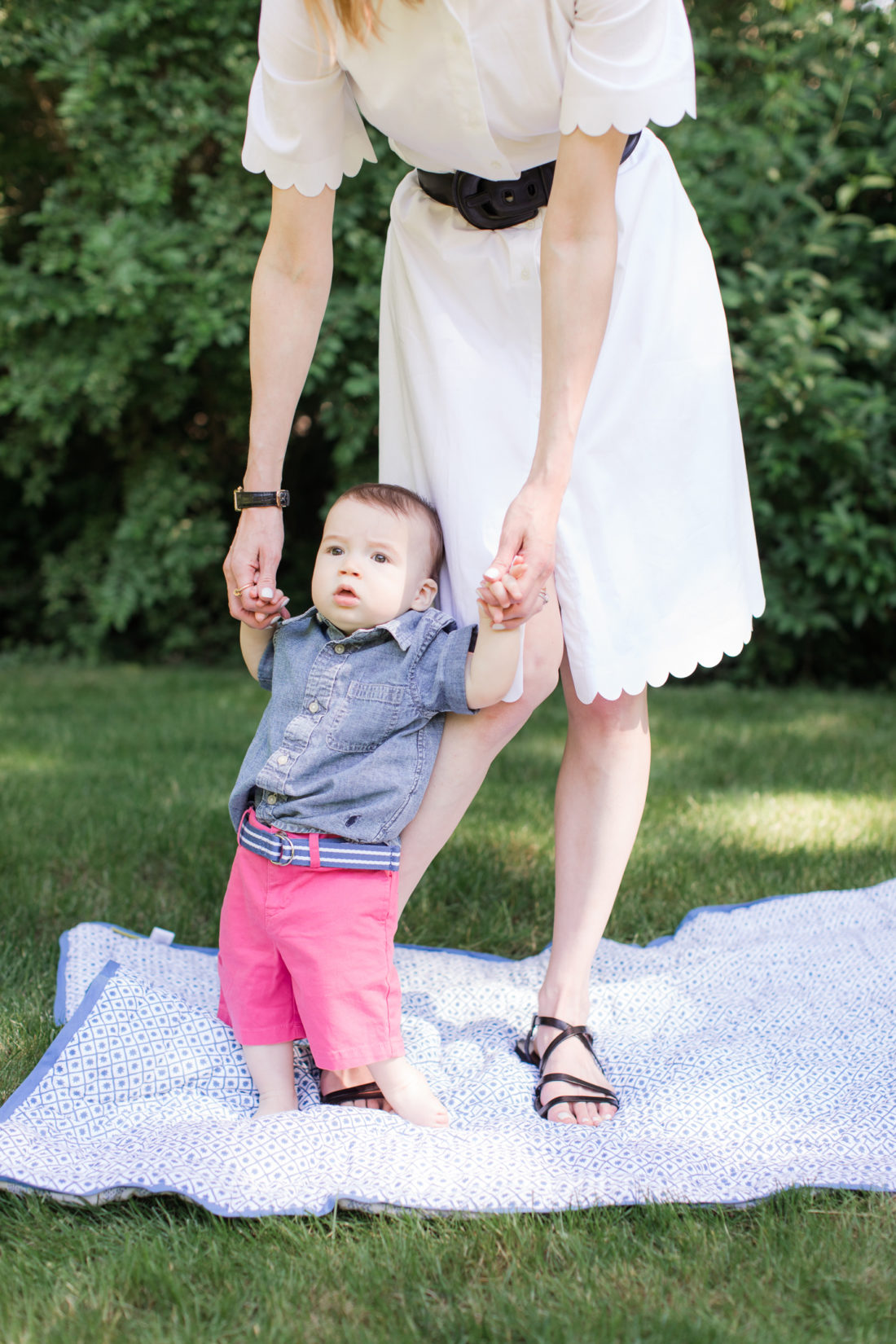 Eva Amurri Martino holds up eight month old son Major outside their connecticut home