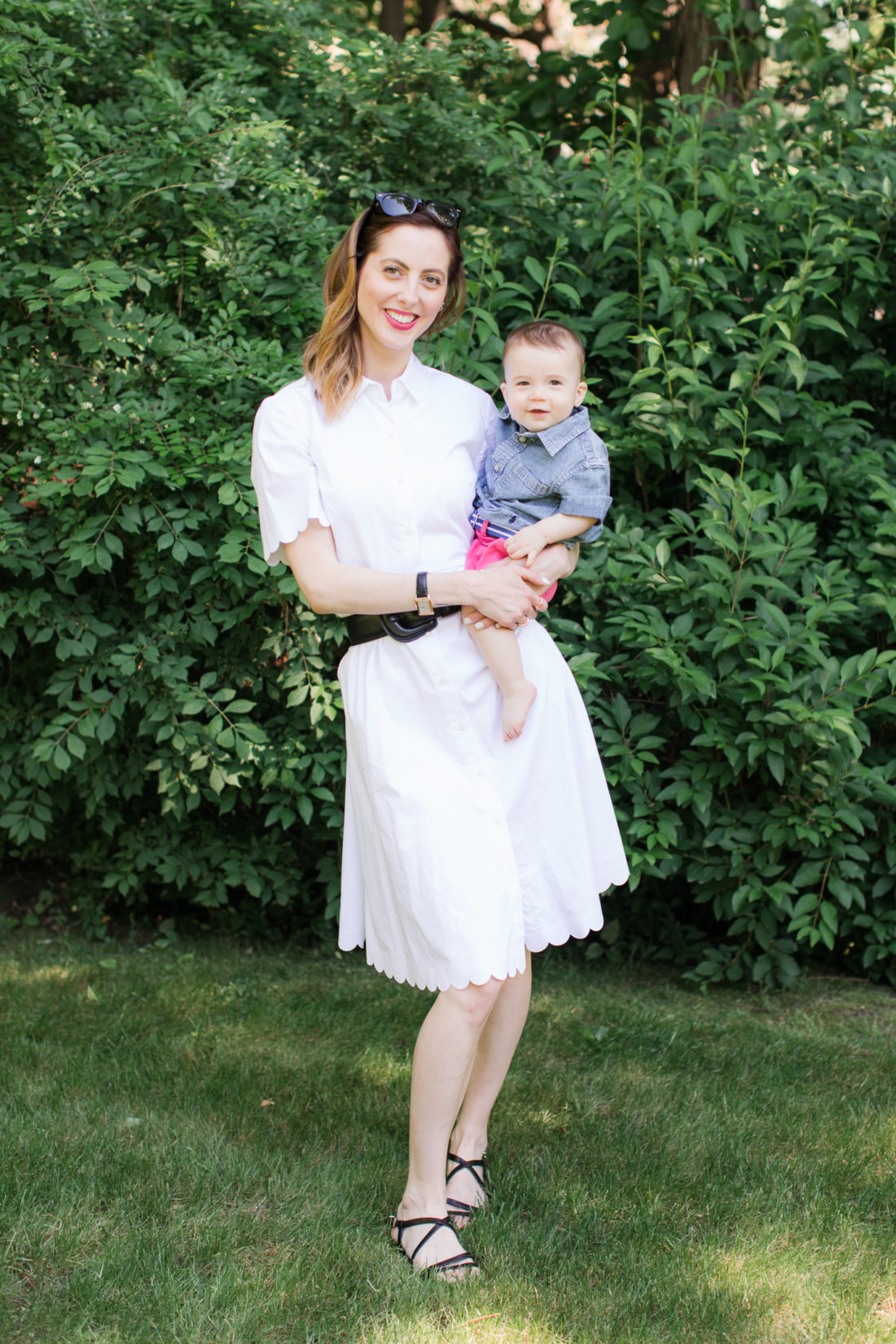 Eva Amurri Martino of lifestyle and motherhood blog Happily Eva After relaxes on a picnic blanket with her two children Marlowe and Major