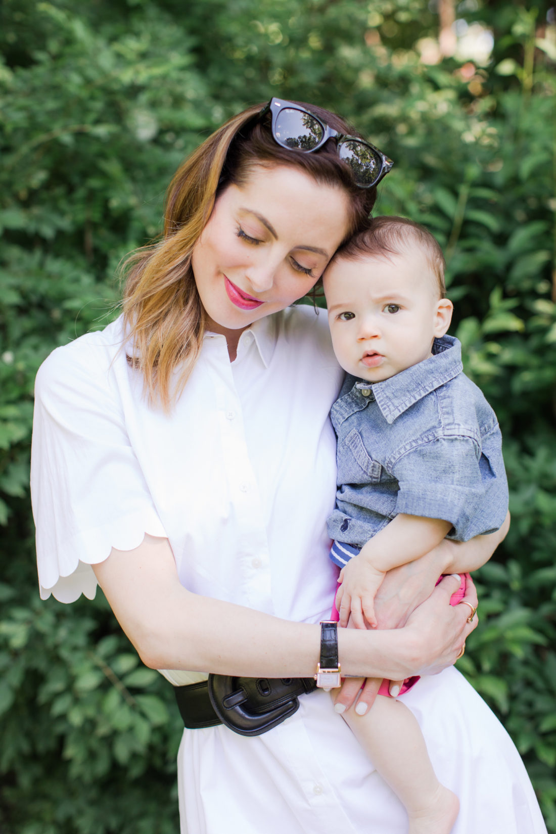 Eva Amurri Martino embraces eight month old son, Major, in the yard of her connecticut home