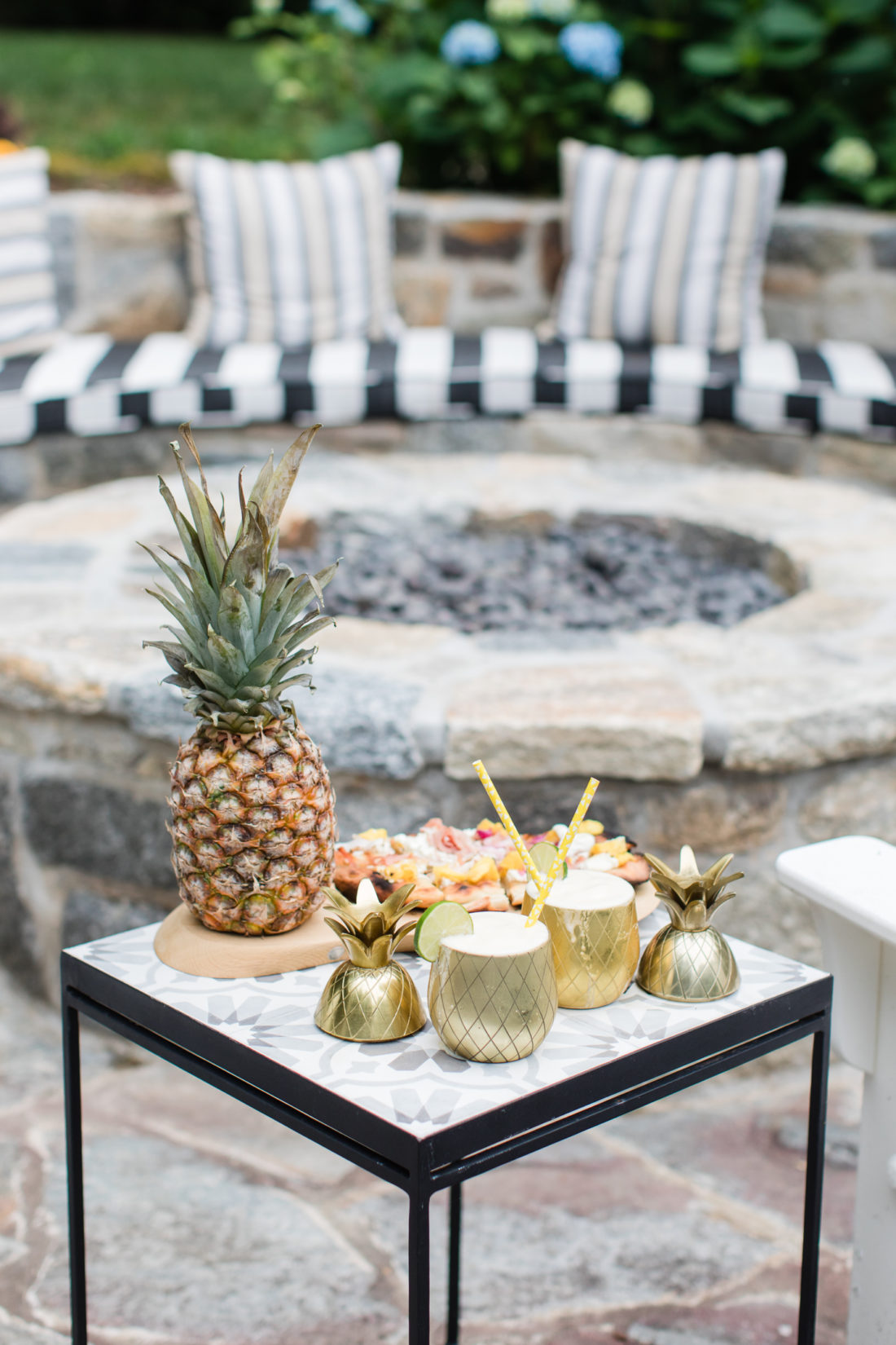 Eva Amurri Martino serves frozen Pineapple daquiris and a grilled hawaiian pizza at a Pineapple-themed happy hour at her Connecticut home