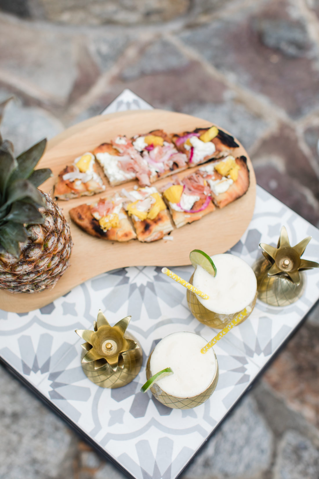 Eva Amurri Martino serves frozen Pineapple daquiris and a grilled hawaiian pizza at a Pineapple-themed happy hour at her Connecticut home