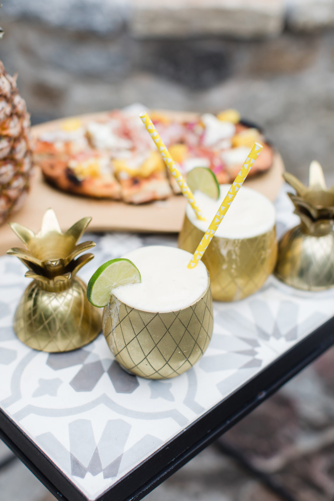 Eva Amurri Martino serves frozen Pineapple daquiris and a grilled hawaiian pizza at a Pineapple-themed happy hour at her Connecticut home
