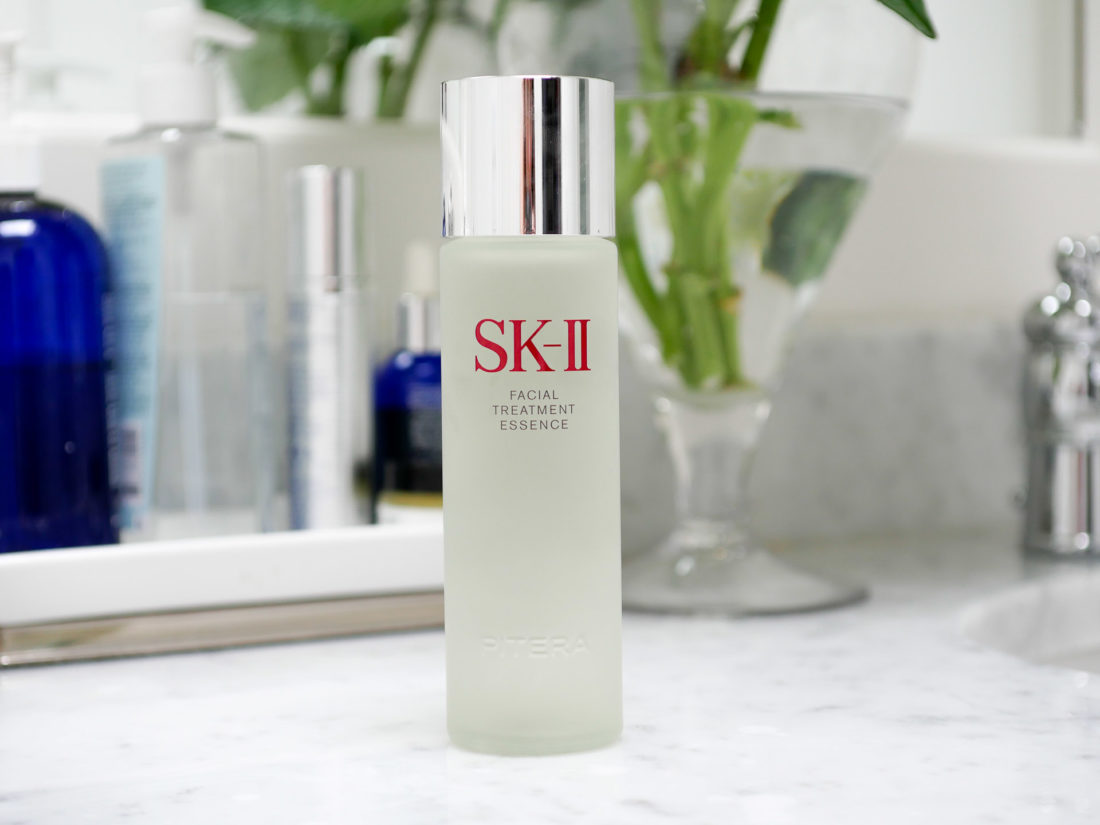 A bottle of SKII Facial Treatment Essence sits on the marble countertop in Eva Amurri Martino's master bathroom