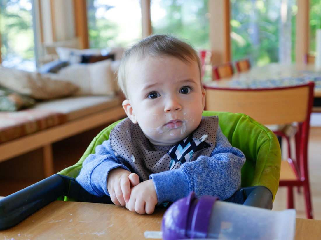 Major Martino sits in a portable high chair