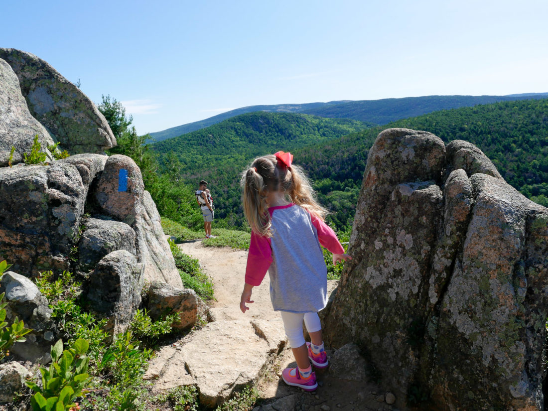 Marlowe Martino hikes along the scenic cliffs in Acadia National park