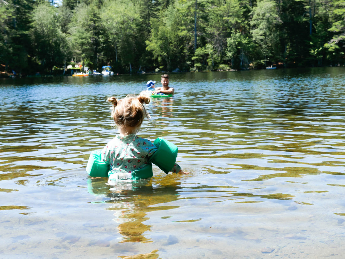 Marlowe Martino wades out in to the water in Long Pond on Mount Desert Island in Maine