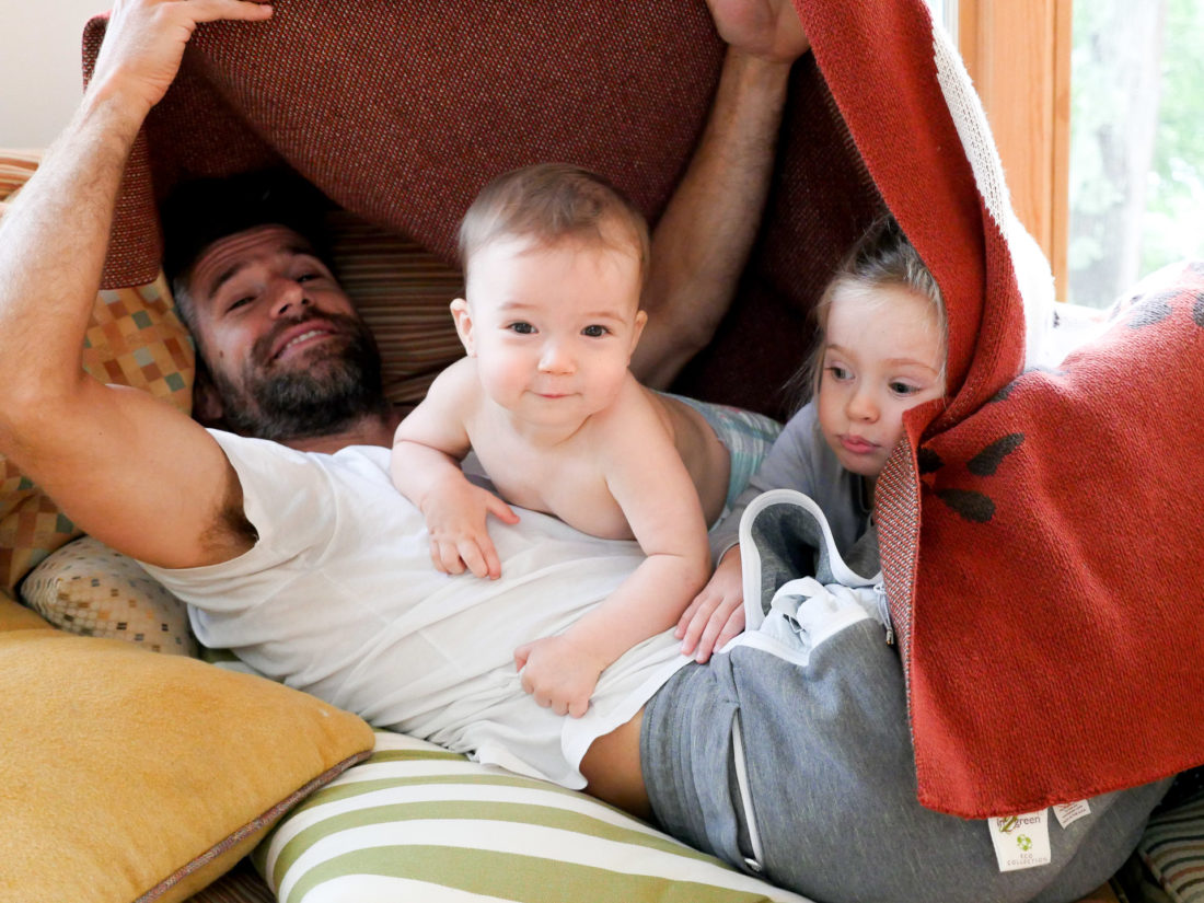 Kyle Martino horses around with his two small children Marlowe and Major at their lake house in Maine