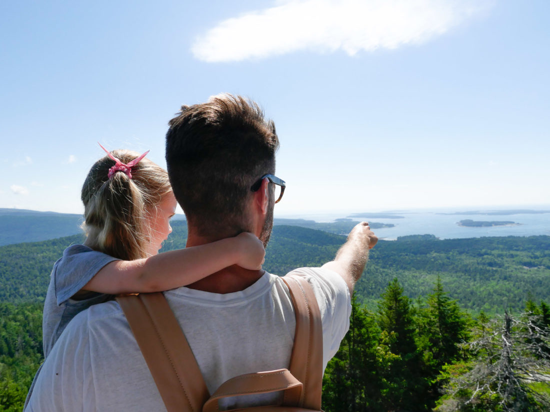 Kyle Martino points out some scenery in the distance to two year old daughter Marlowe 