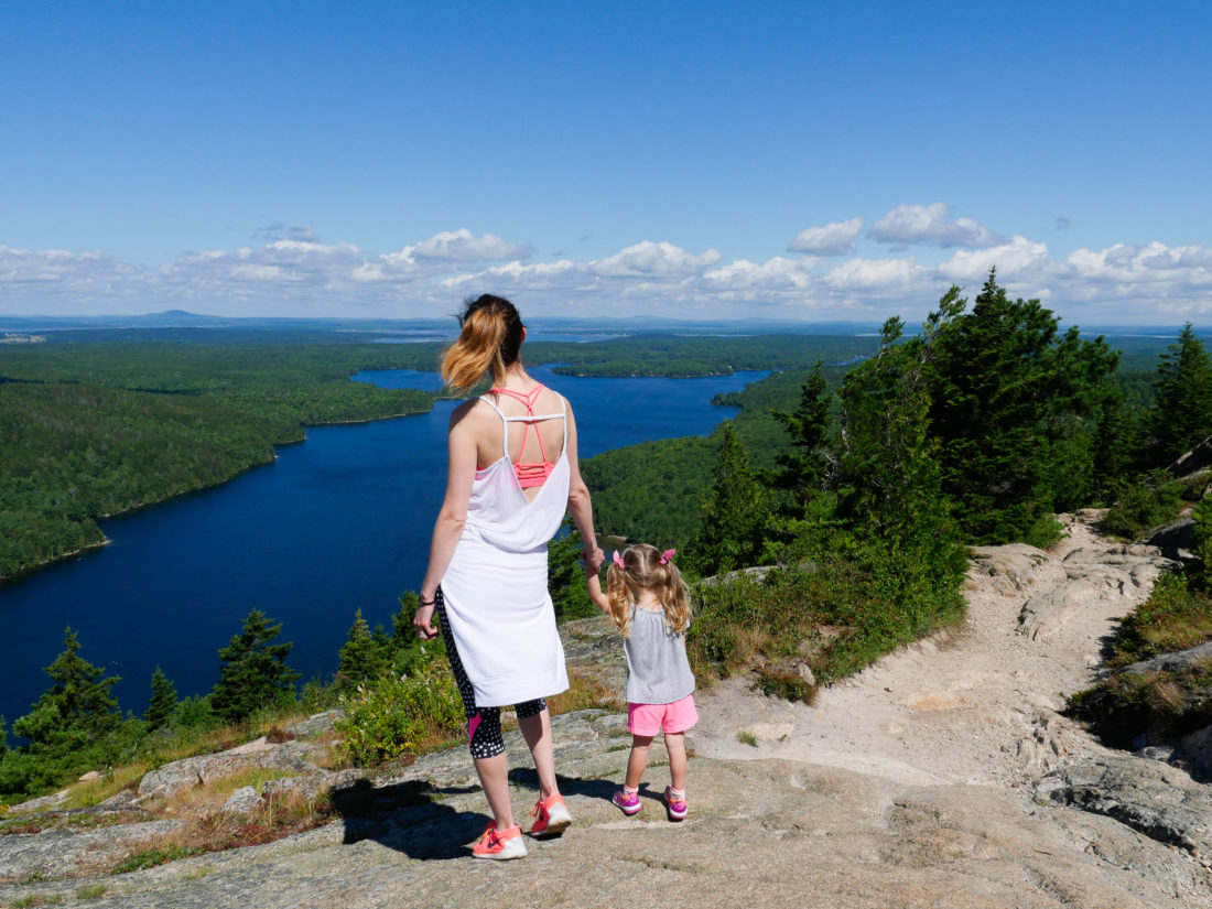 Eva Amurri Martino dons workout gear and hikes the cliff trails of Acadia National Park with two year old daughter Marlowe