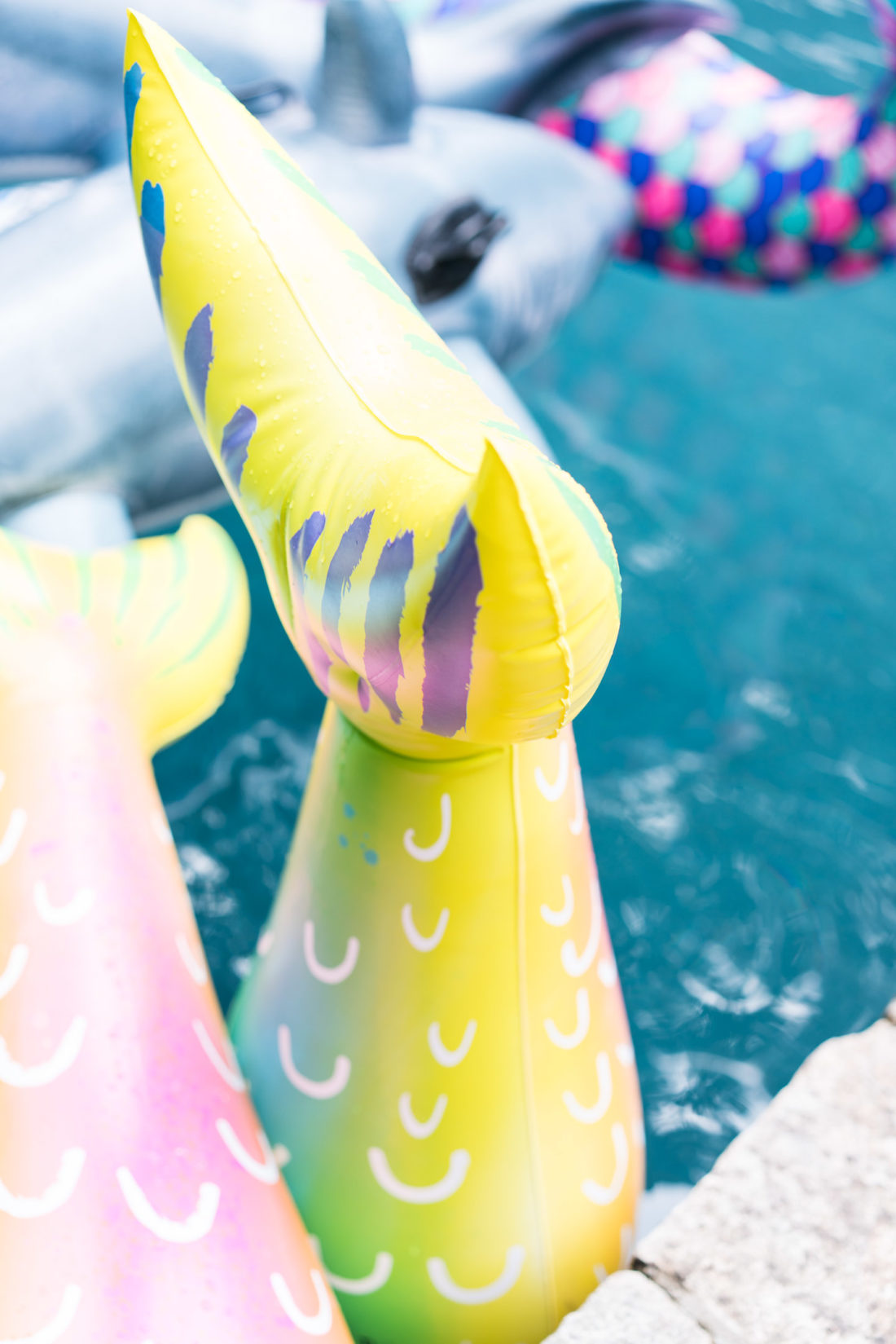 The pool floats at Marlowe Martino's third birthday party with a Mermaids vs. Sharks theme