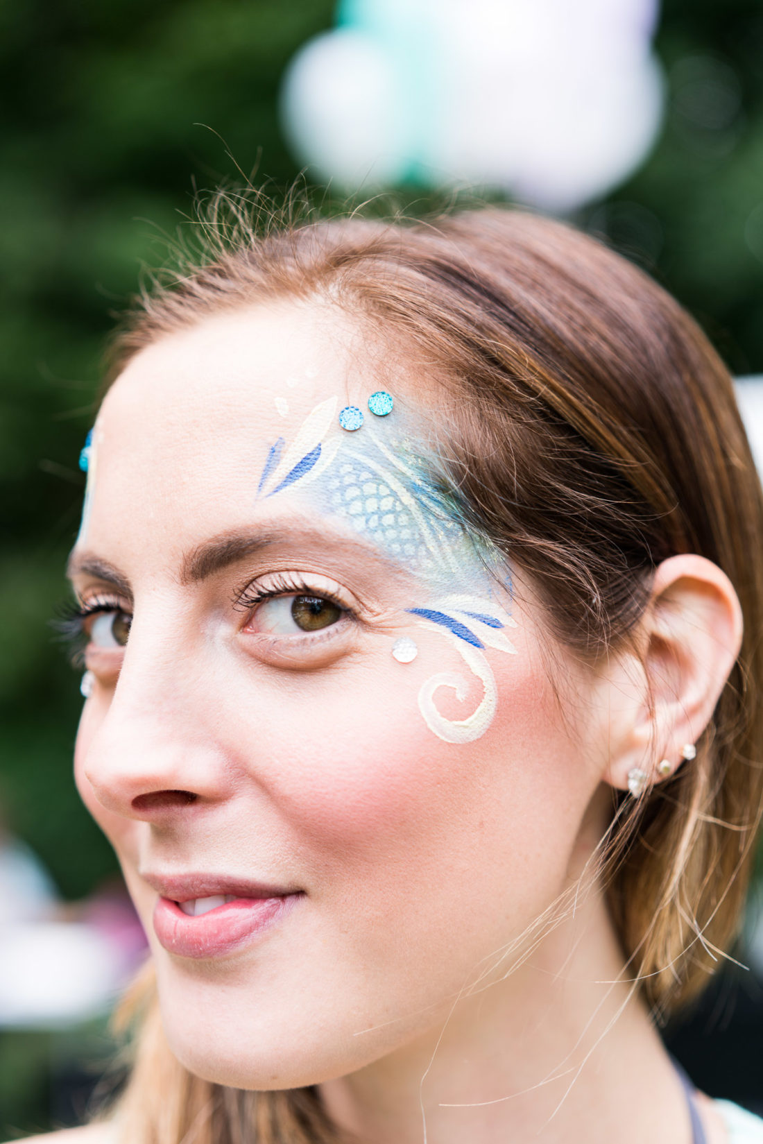 Eva Amurri Martino gets her face painted like a mermaid at her daughter Marlowe's third birthday party
