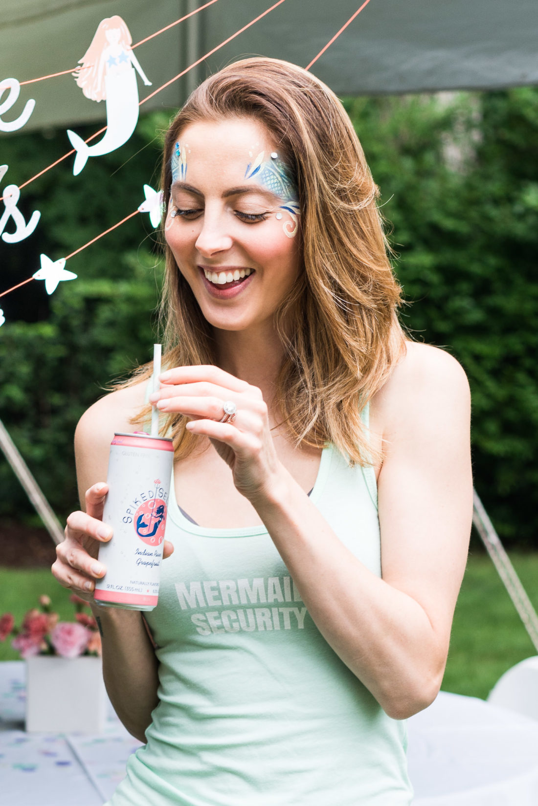 Eva Amurri Martino enjoys a cocktail at Marlowe Martino's third birthday party