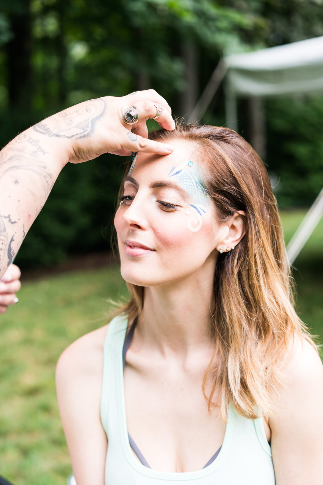 Eva Amurri Martino gets her face painted like a mermaid at her daughter Marlowe's third birthday party