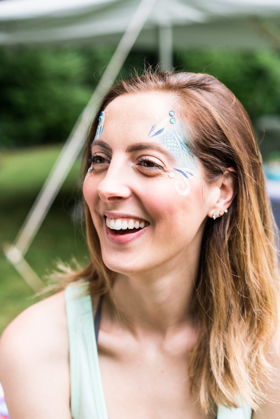 Eva Amurri Martino gets her face painted like a mermaid at her daughter Marlowe's third birthday party