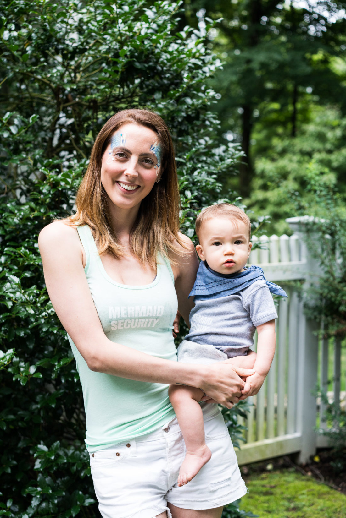 Eva Amurri Martino and Major Martino wear "Mermaid Security" shirts, designed using The Happily App