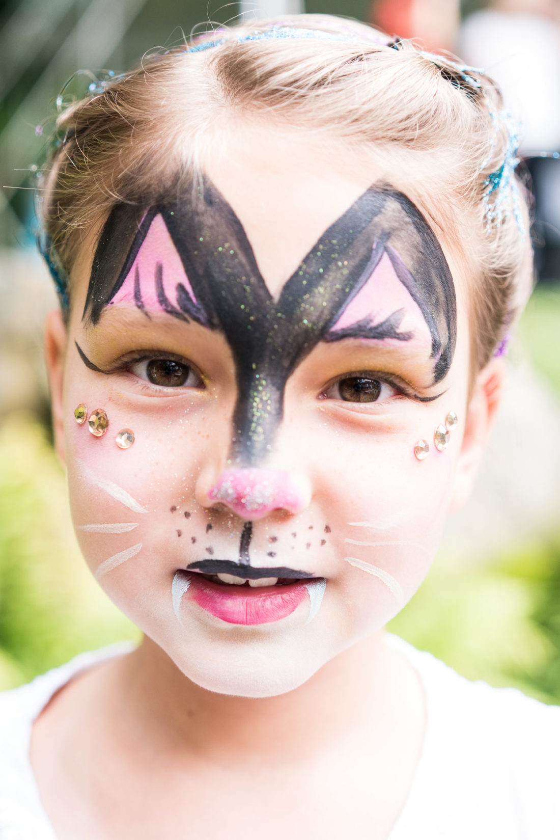 Guests get their face painted at Marlowe Martino's third birthday party