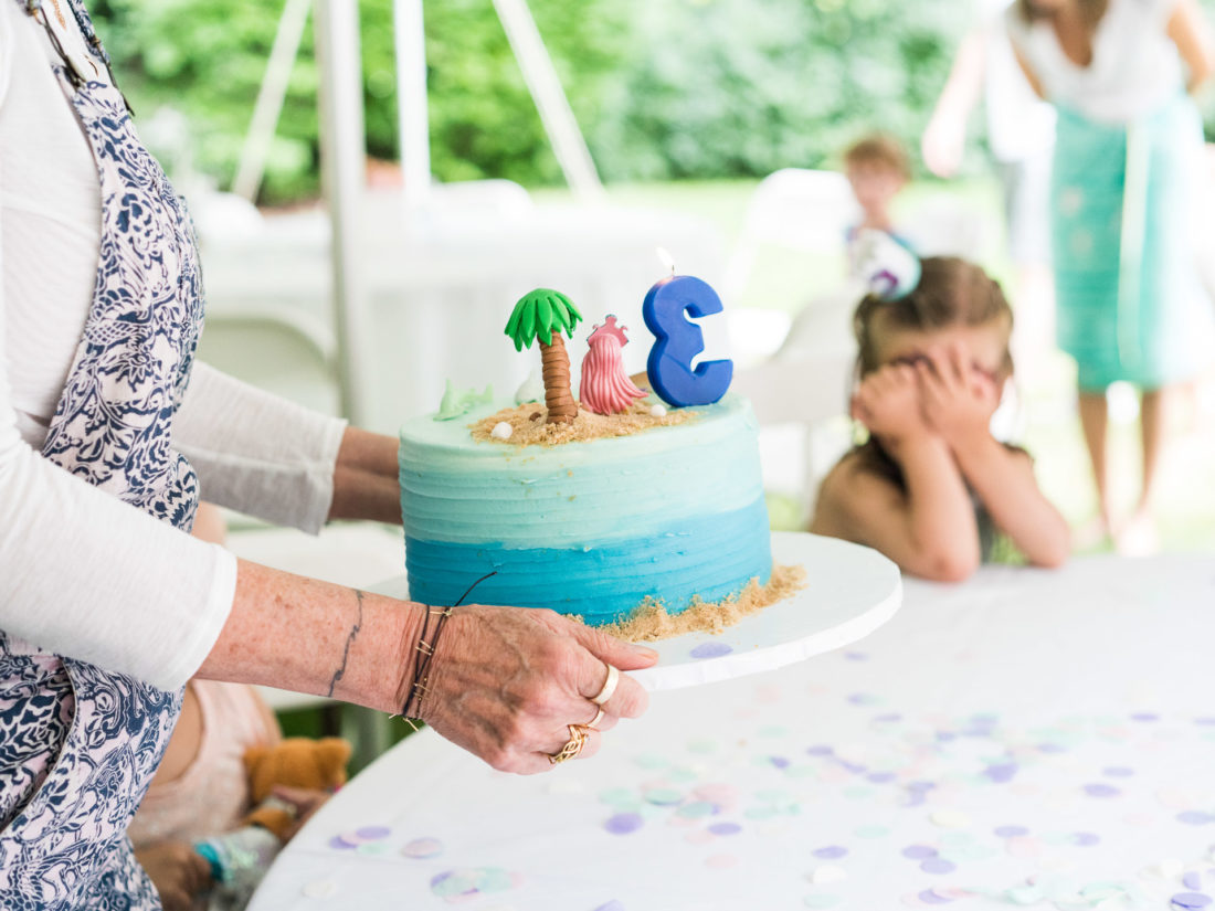 Guests sing happy birthday to Marlowe Martino at her third birthday party