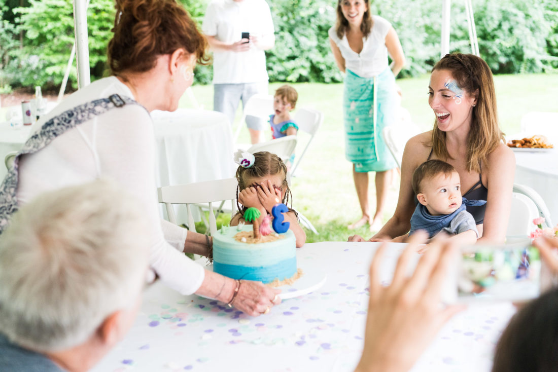 Guests sing happy birthday to Marlowe Martino at her third birthday party