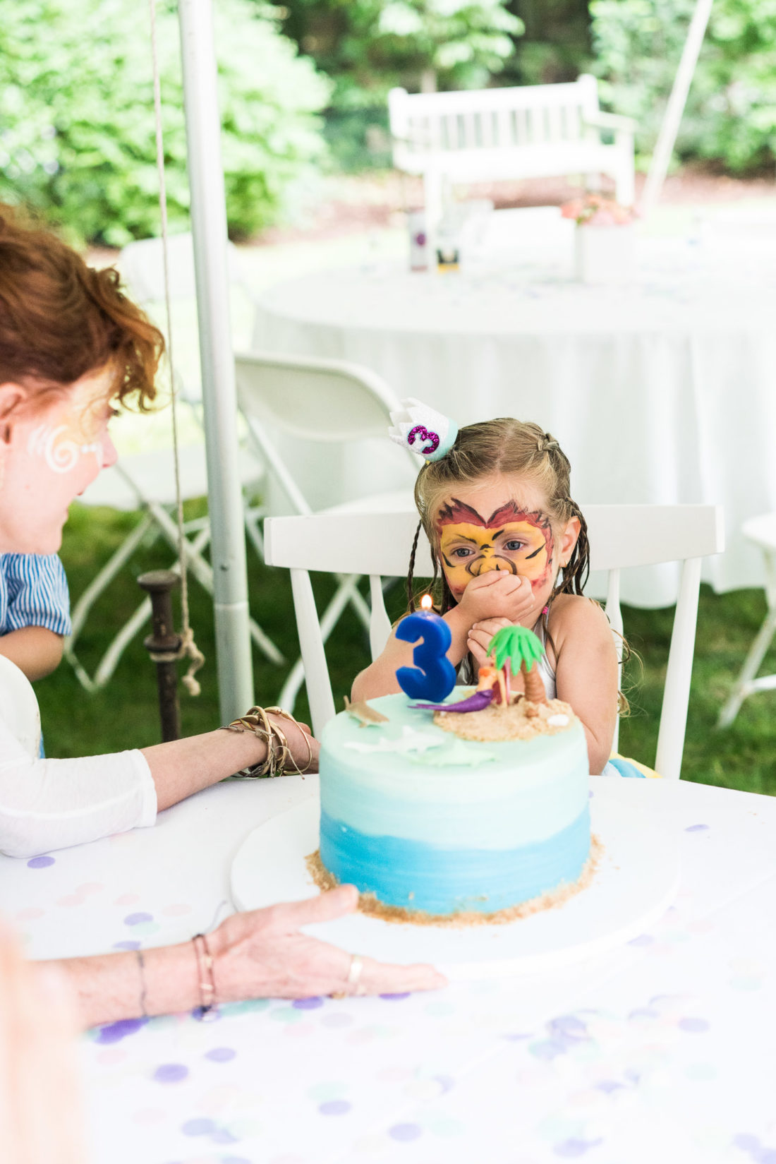 Guests sing happy birthday to Marlowe Martino at her third birthday party