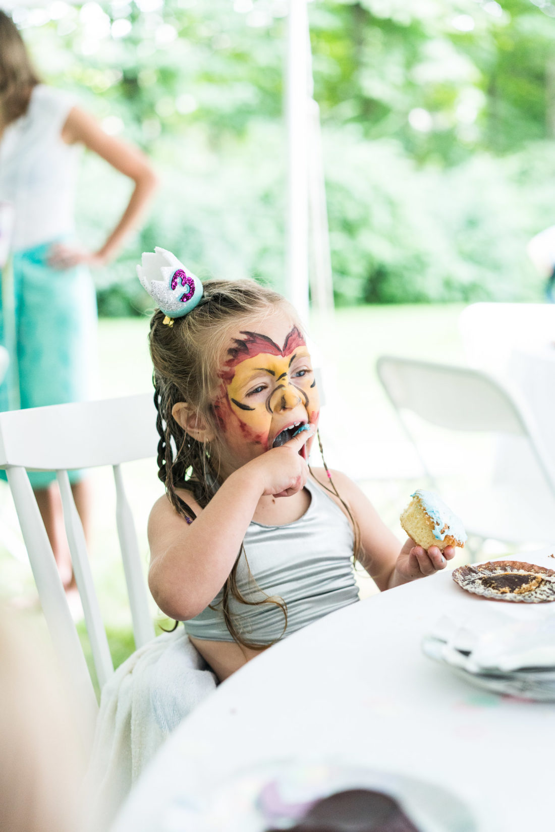 Marlowe Martino digs in to a birthday cupcake at her third birthday party