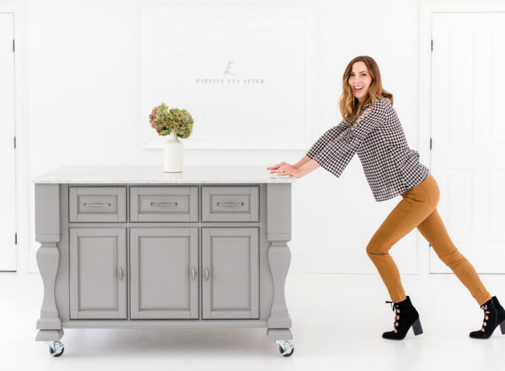 Eva Amurri Martino pushes her grey crafting island across the floor of the Happily Eva After studio