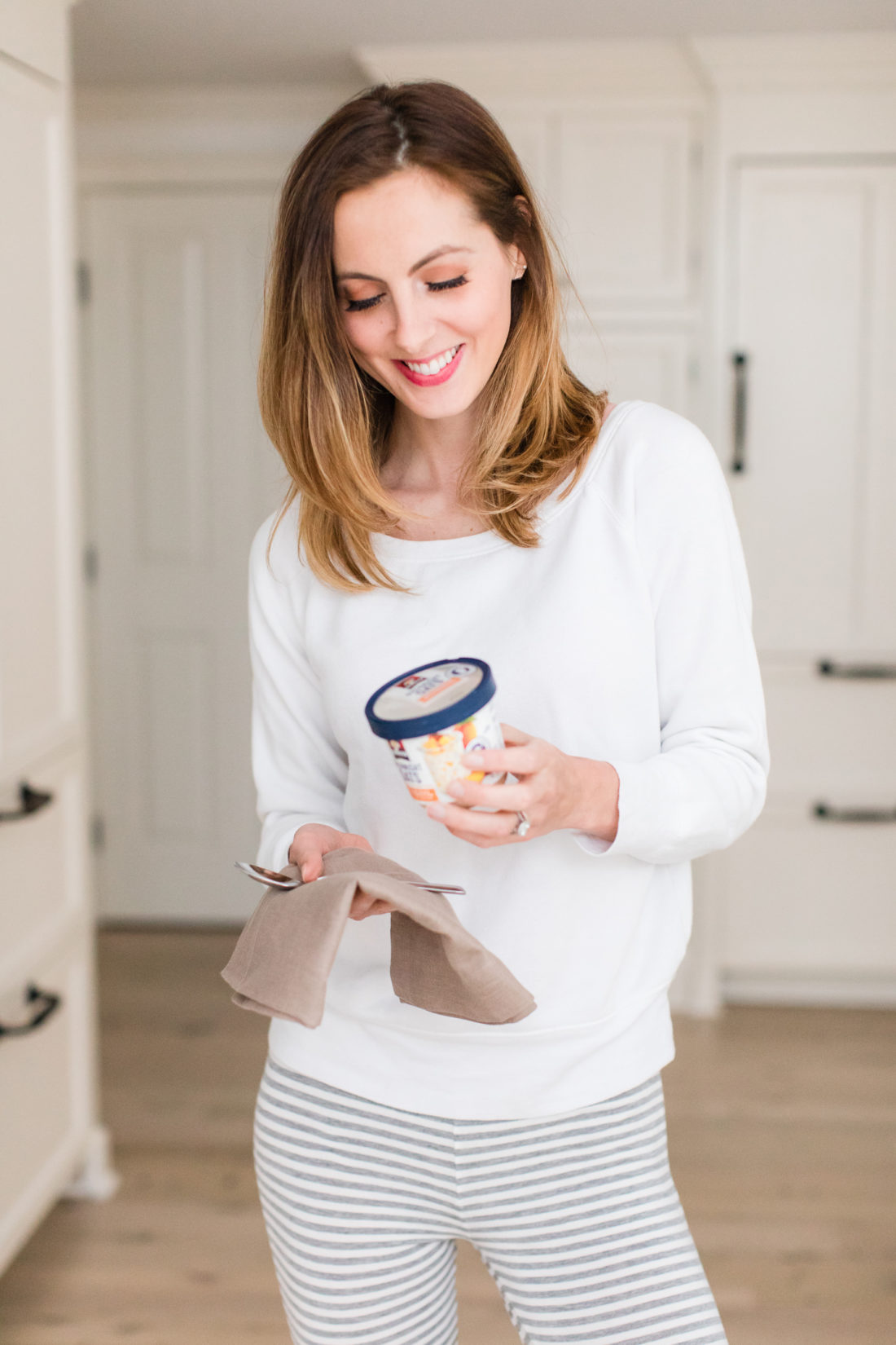 After steeping overnight, Eva Amurri Martino wears pajamas and prepares to eat her Quaker Overnight Oats for breakfast