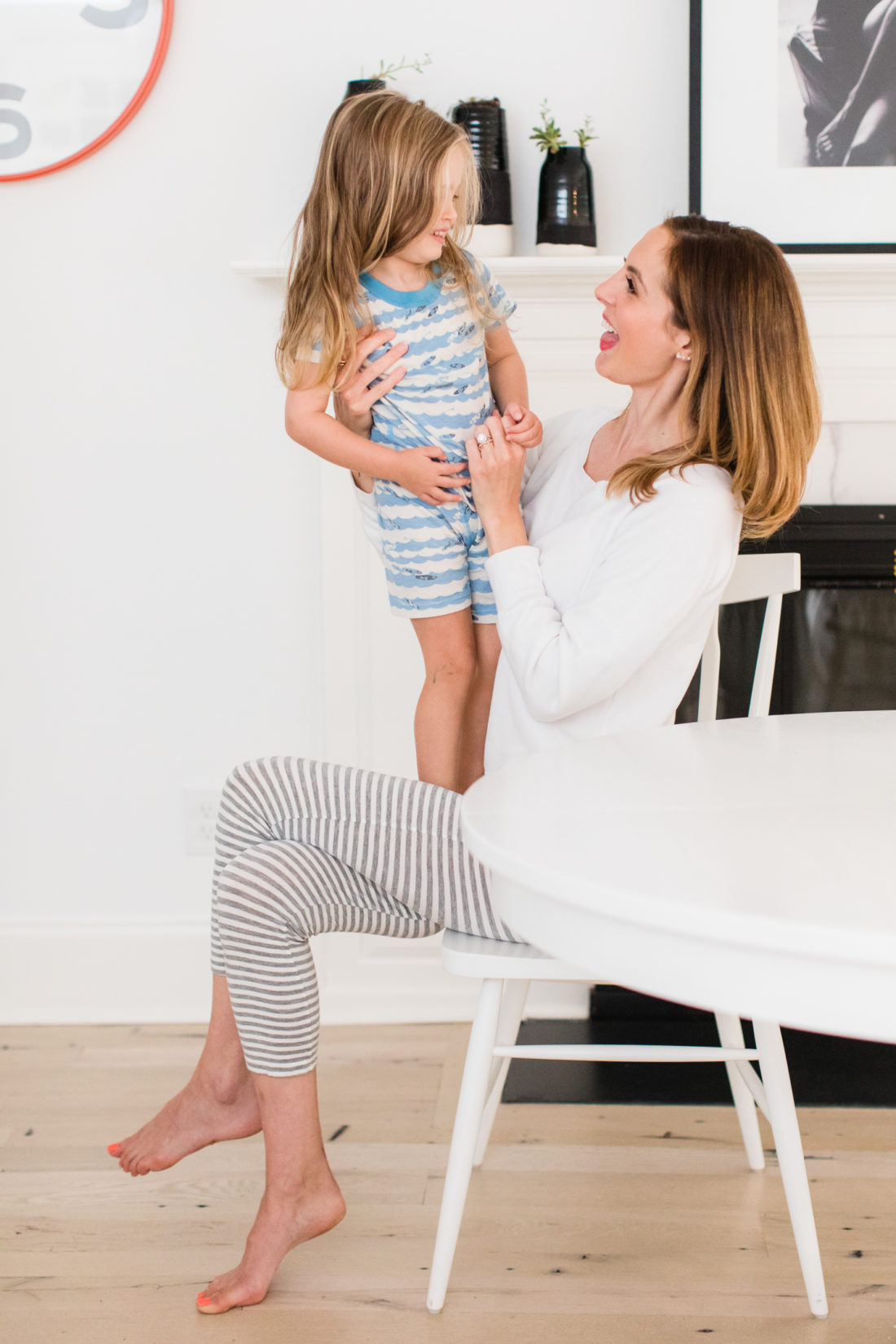 Eva Amurri Martino tickles daughter marlowe in the morning at the kitchen table in their conecticut home