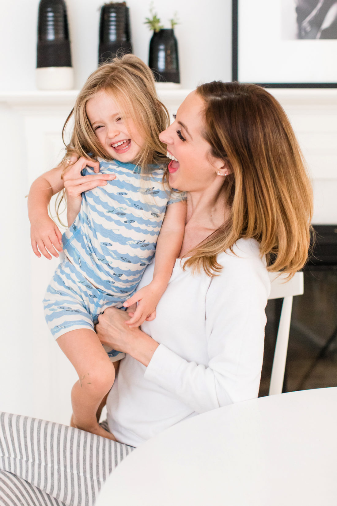 Eva Amurri Martino tickles daughter marlowe in the morning at the kitchen table in their conecticut home