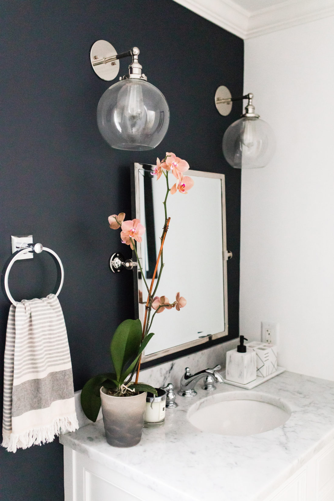 Eva Amurri Martino shares the full redesign of her black, white, and grey concept powder room in her Connecticut home