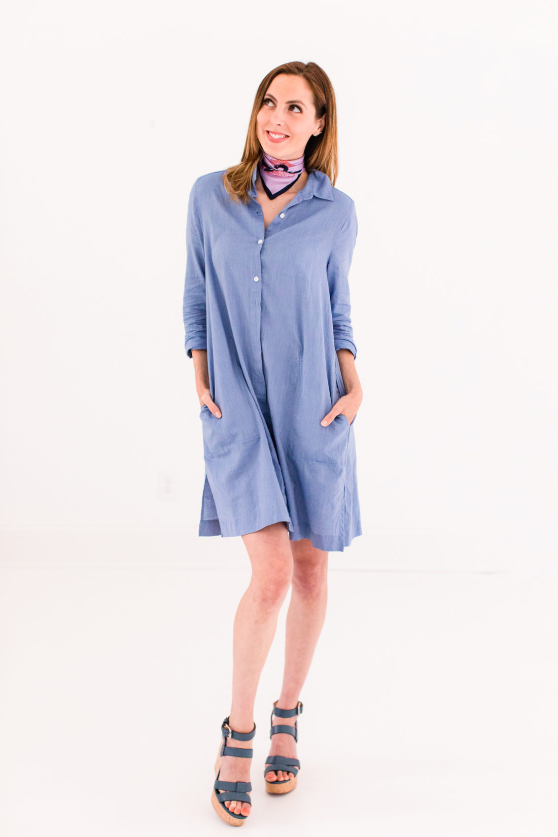 Eva Amurri Martino wears a light blue shirtdress and a silk scarf bandana tied around her neck