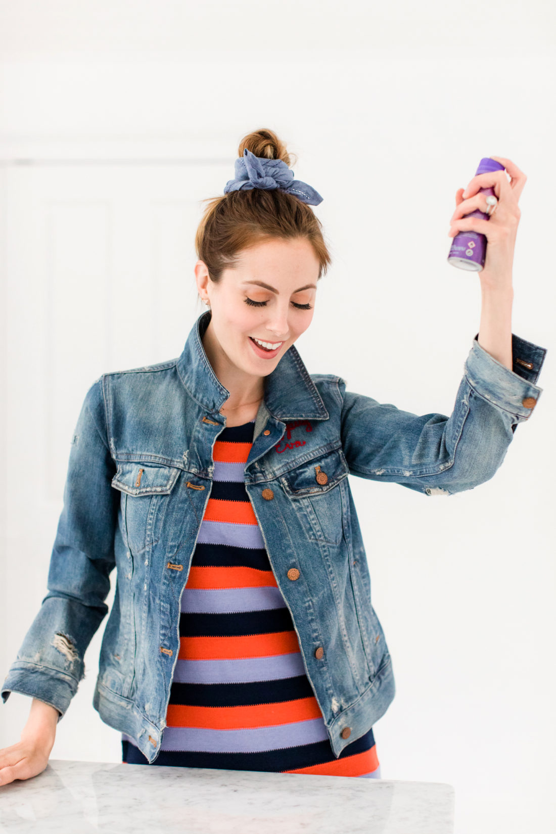 Eva Amurri Martino sprays her kerchief bun hairstyle with felxible hold hairspray