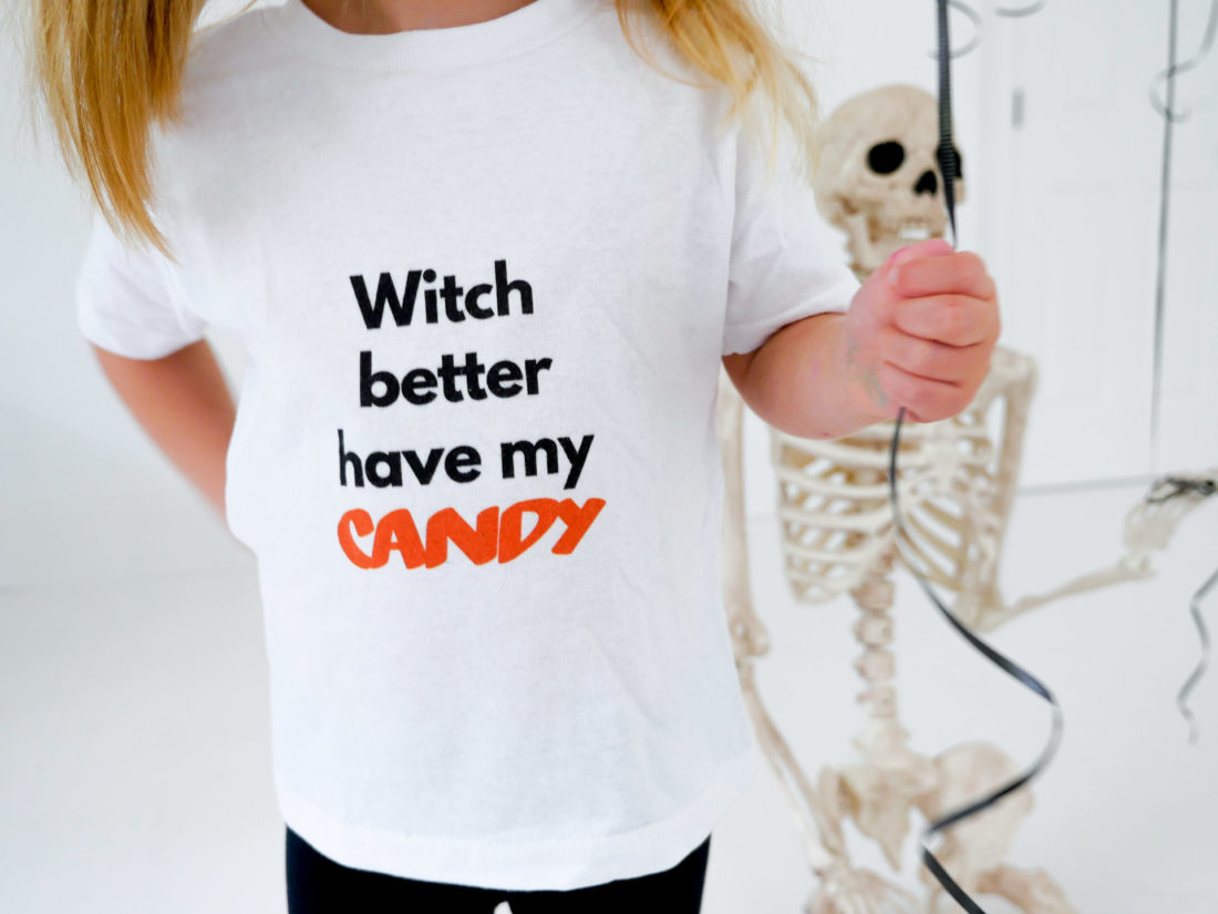 Marlowe Martino wears a festive Halloween tee shirt designed using The Happily App