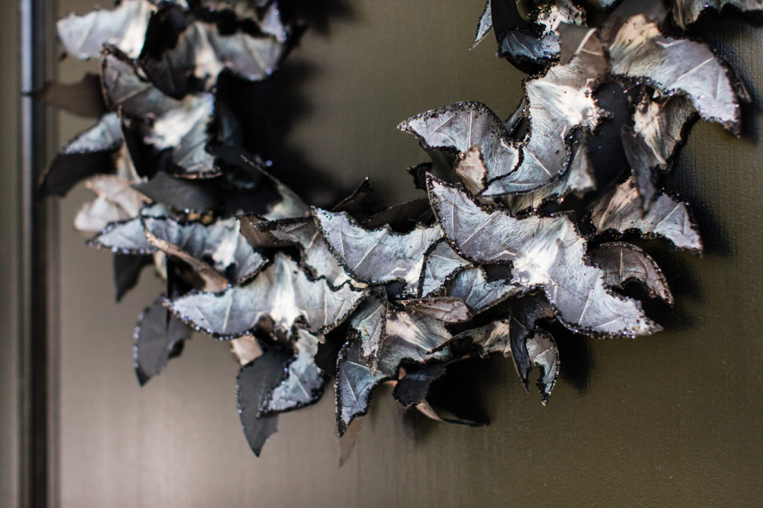 A detail of the sparkly, spooky bat themed wreath on the door of Eva Amurri Martino's Connecticut home